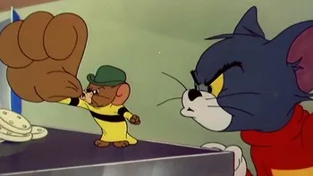 Cousin Muscles from Tom and Jerry holding his fist up while looking at Tom