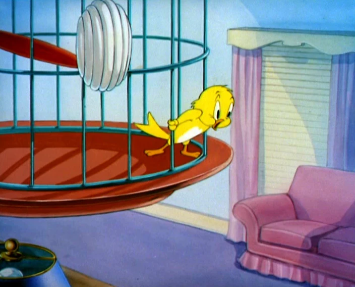 Cuckoo from Tom and Jerry surprised inside his cage
