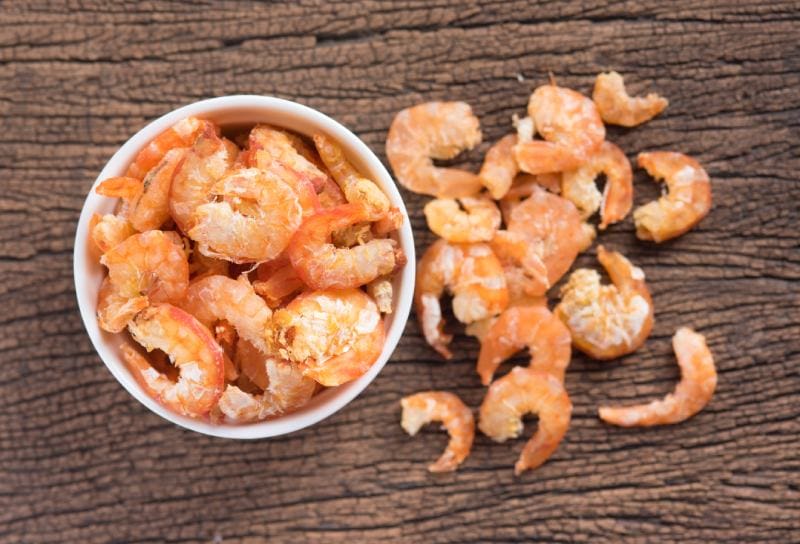 Dried Shrimps on wood Background
