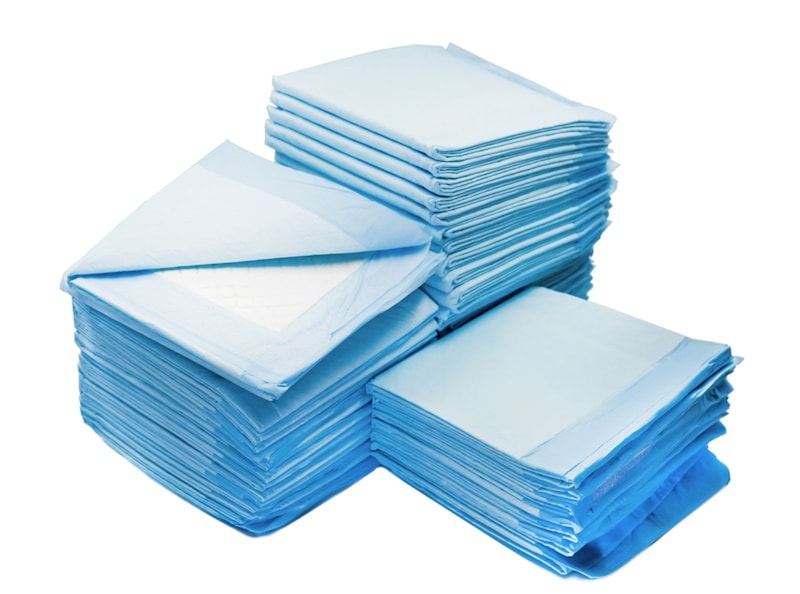 Folded napkins on white background