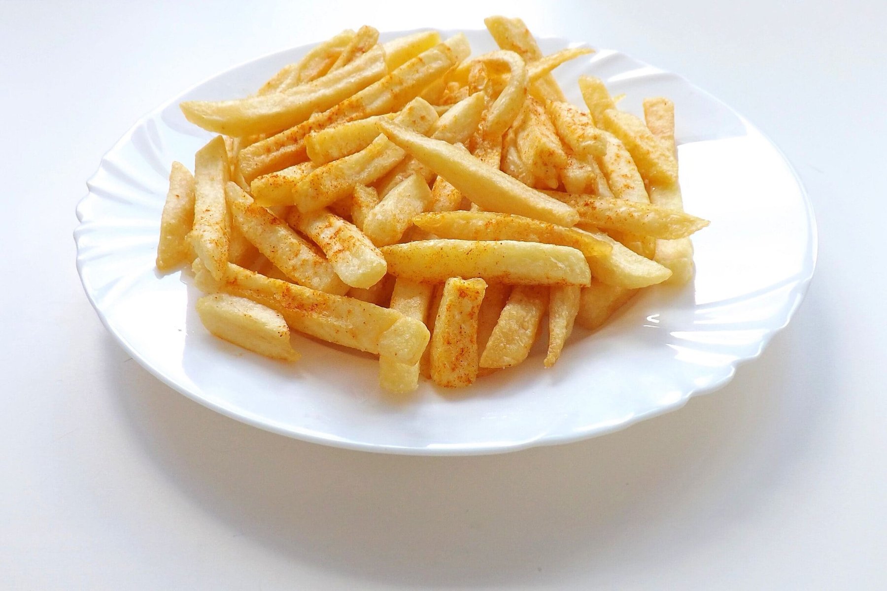 French fries on white plate