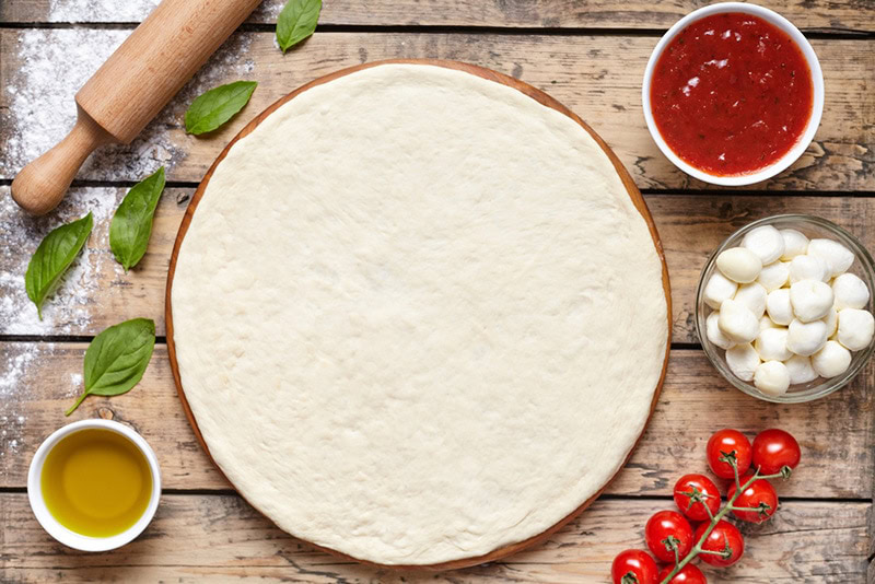 Raw dough preparation or pizza