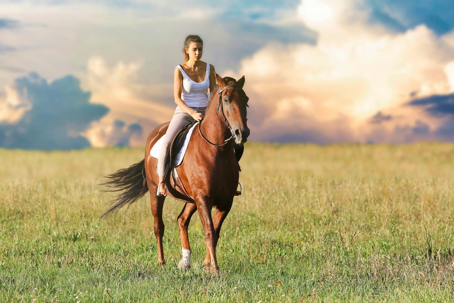Girl riding horse
