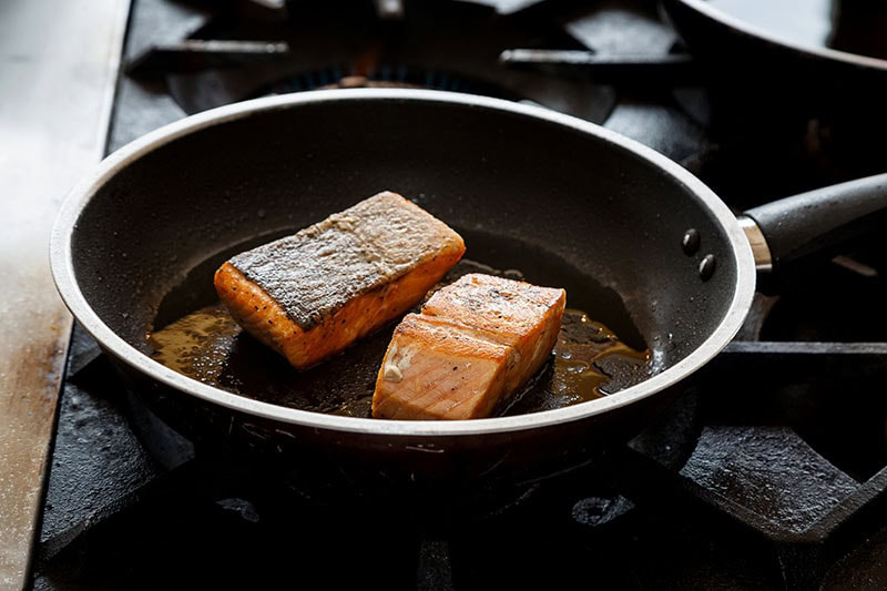 Salmon fry in pan
