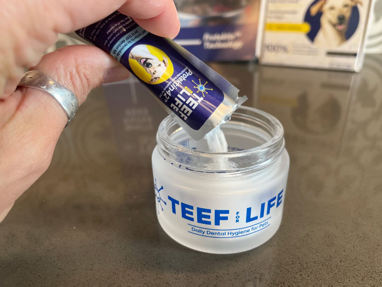 TEEF for Life.jpg - pouring the product in the jar