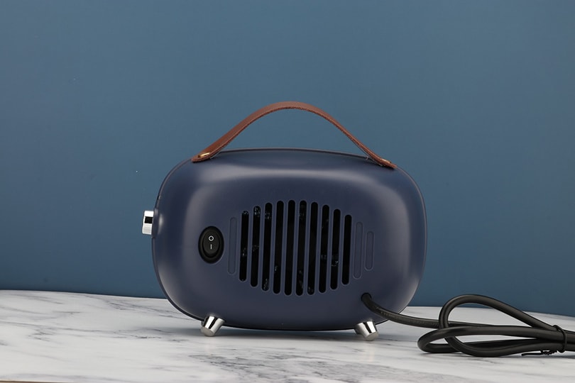 a portable space heater on a slab