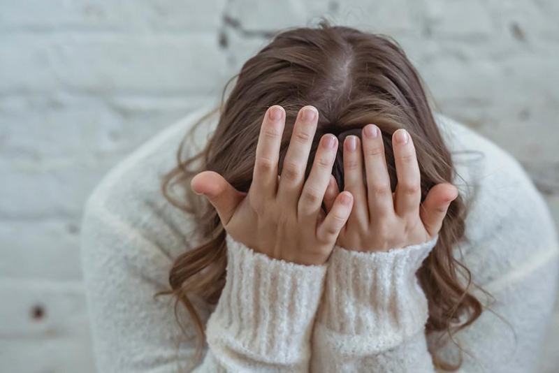 a woman with headache