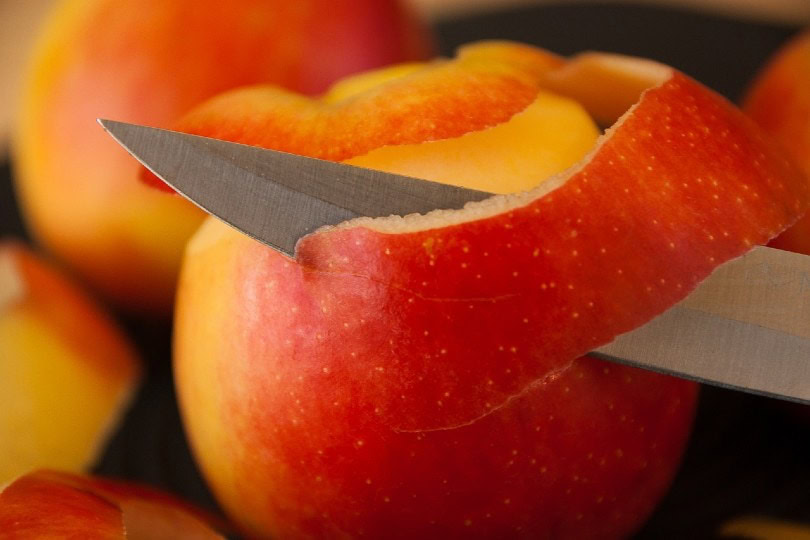 apple skin peeled off by knife