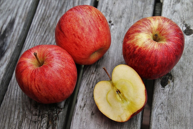 apples on a wooden table