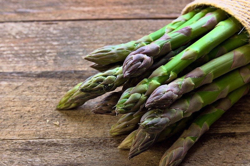 asparagus on wooden table