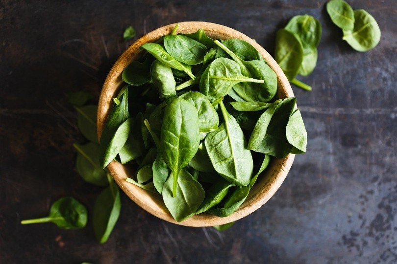 basil herbs in a wooden bowl