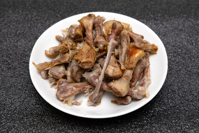 chicken bones on a plate
