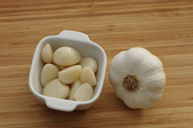 garlic on a wooden background
