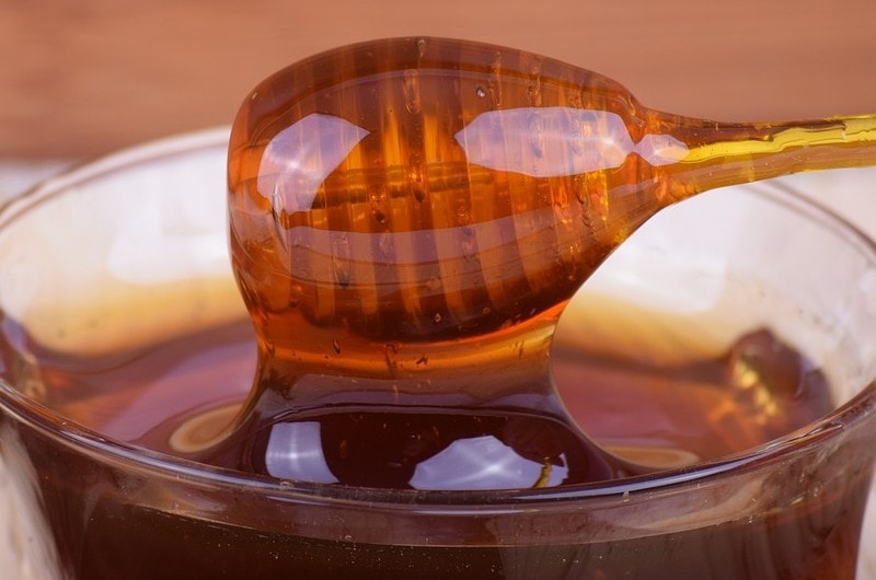 honey in a glass bowl
