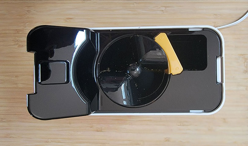 interior of petcube bites 2 lite showing the plastic treat sizing device