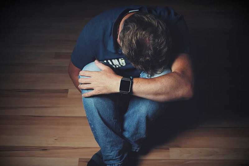 man mourning emotion