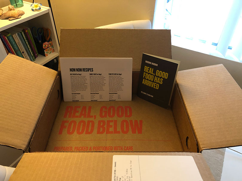 nom nom dog food packaging