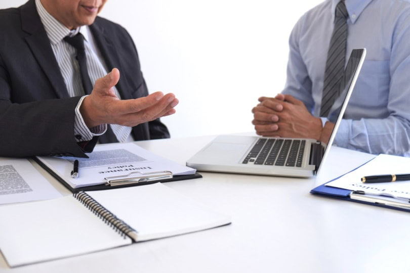 sales agent talking to client