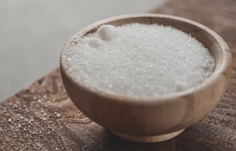 sugar in a wooden bowl