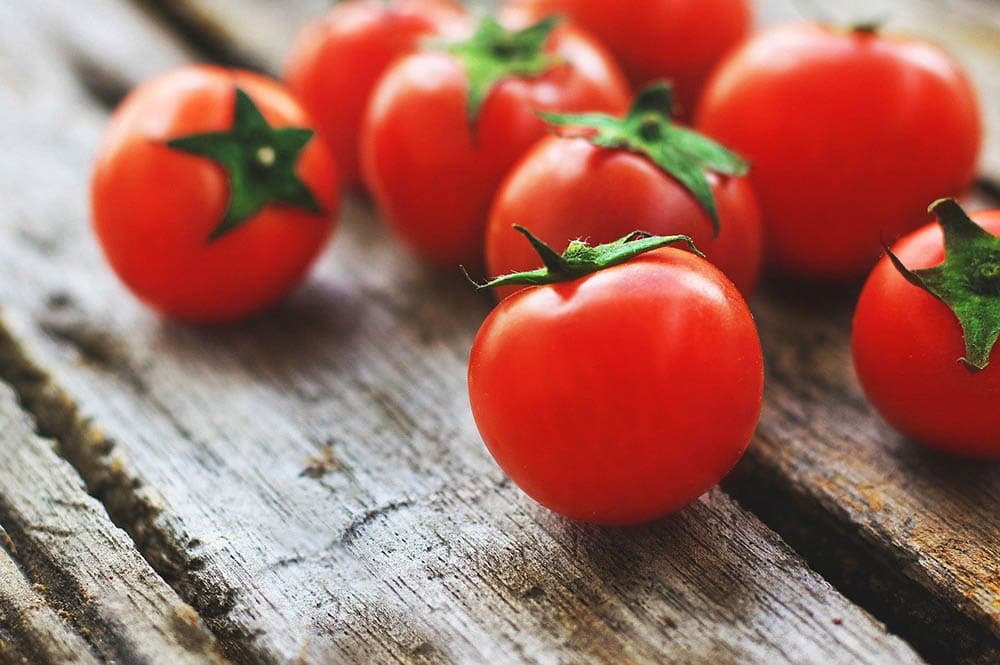 tomatoes on the wooden table