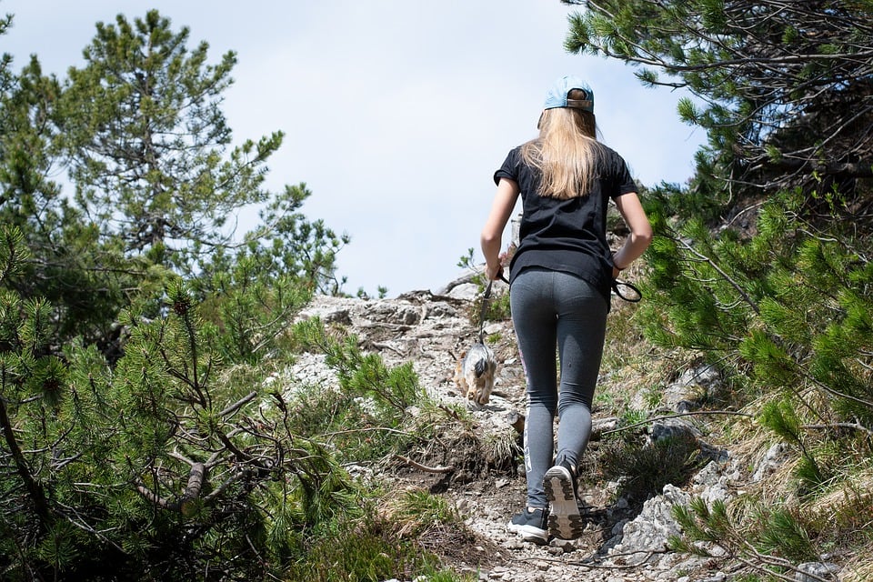 woman and dog hiking