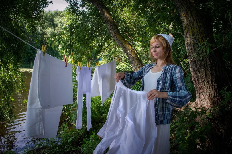 woman drying clothes