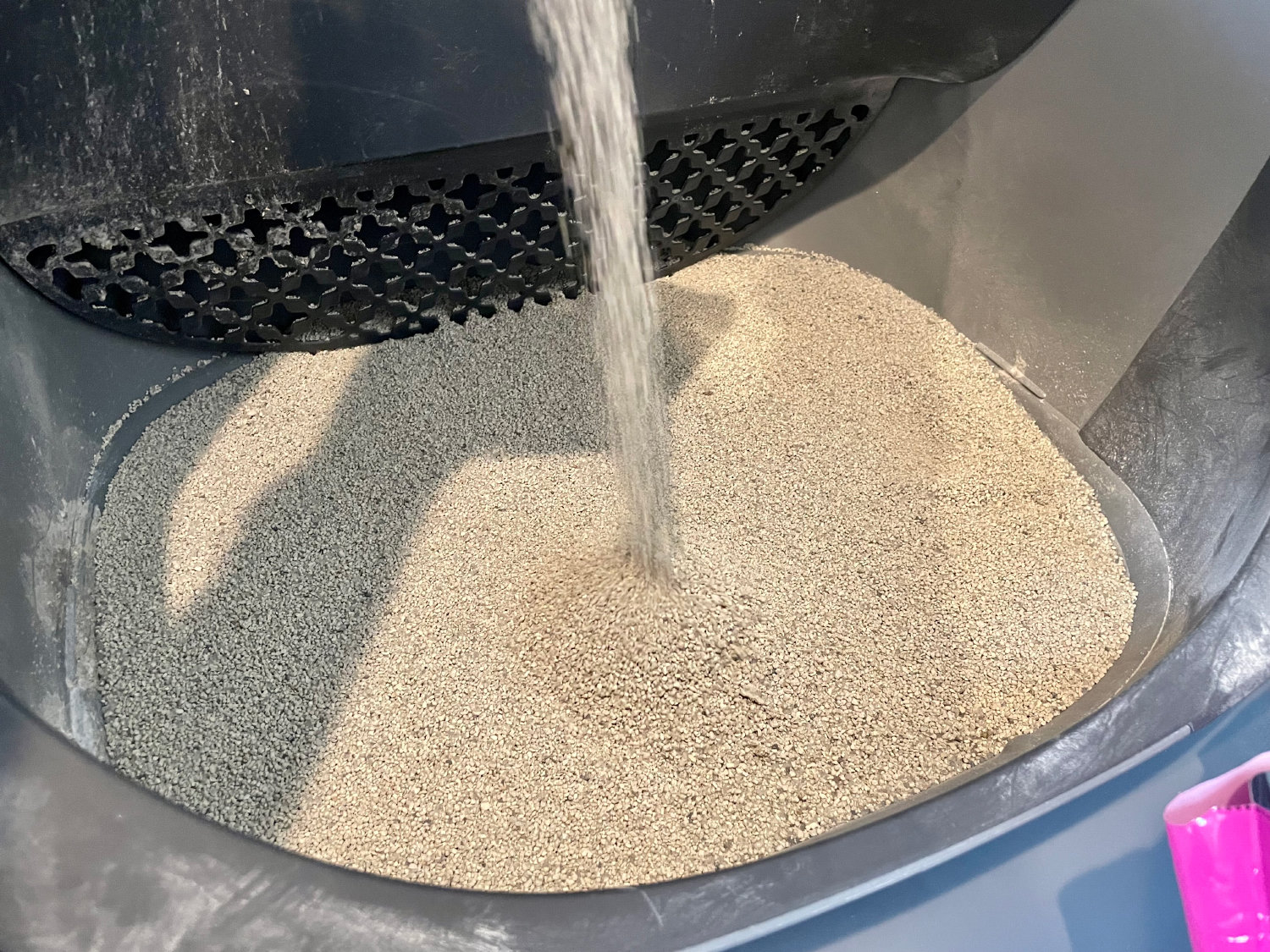 Boxie Glo Natural Attractions Clumping Clay Litter - pouring litter to the litter box