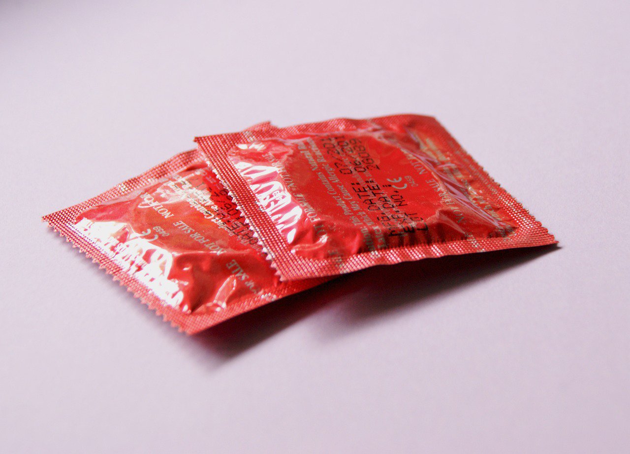 two packs of condoms